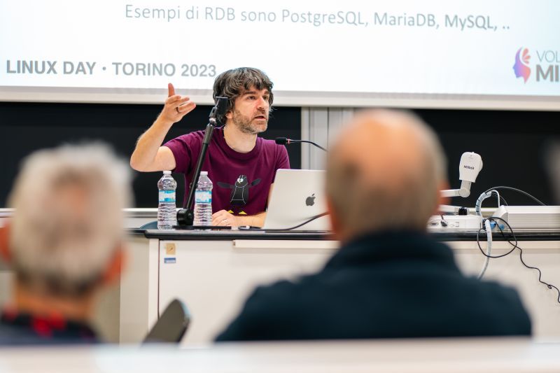 Davide Morra from Volcanic Minds speaking at Linux Day Turin